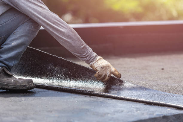 Professional Basement Waterproofing technician working in Fairfax Station, VA